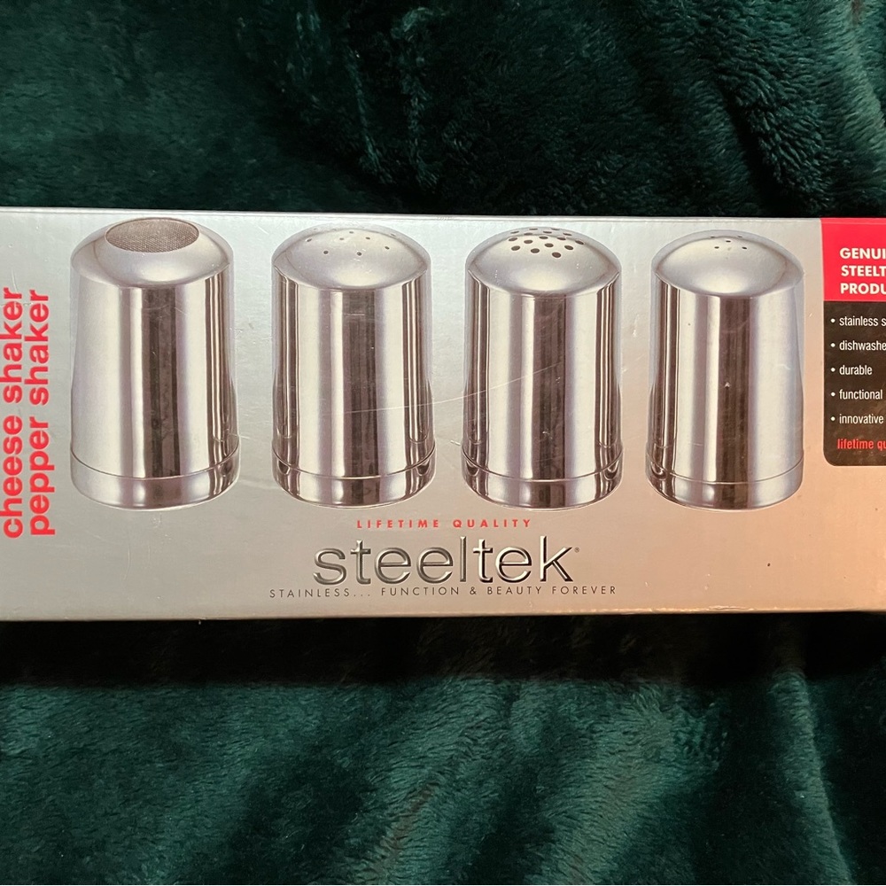 new still in box set of 4 stainless steel shakers